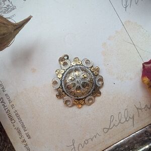 Elegant Gold and Silver Pendant